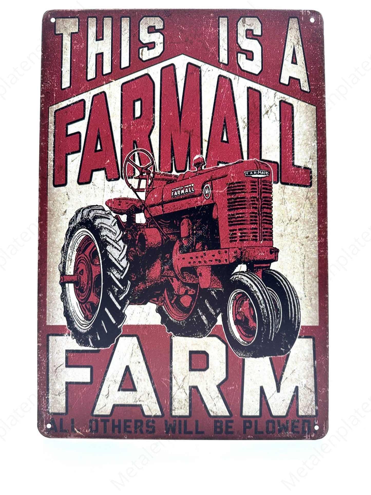 This is a Farmall - Metal Wall Sign